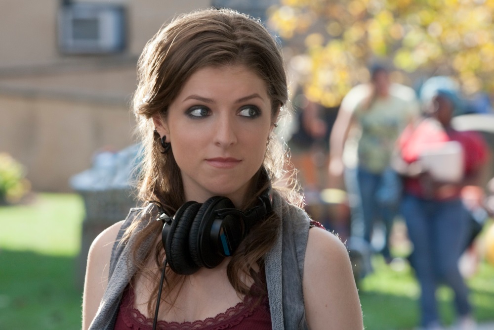 Picture of Beca in Pitch Perfect wearing a pair of headphones